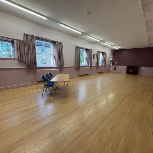 photo of Main Hall with windows and piano